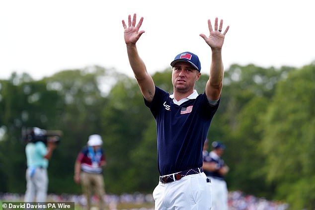 Justin Thomas appeals to the crowd to be quiet during his match against McIlroy and Lowry