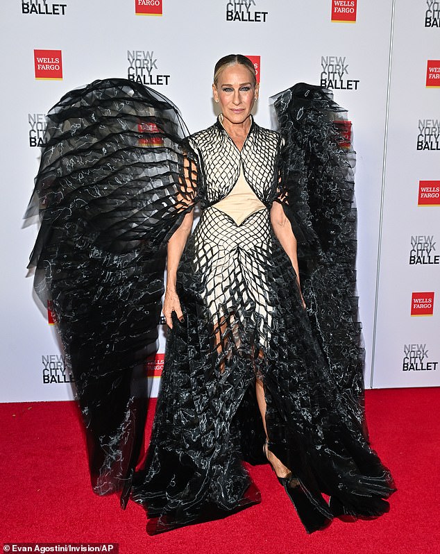 Parker wowed onlookers in a wild winged outfit as she posed for photos on the red carpet