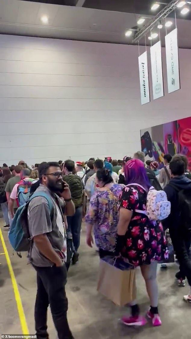 One user wrote the evacuation had been 'calm' on X (pictured, people move towards the exit)