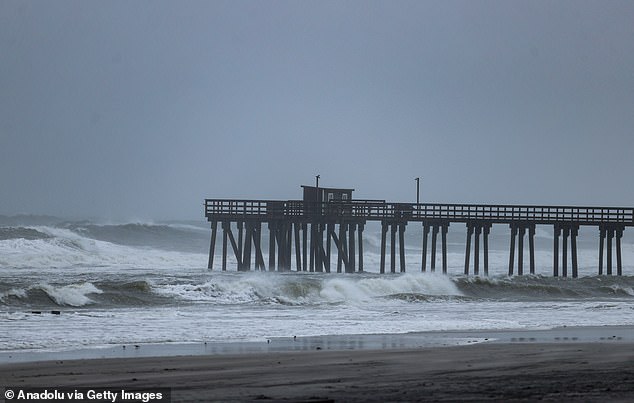A powerful nor'easter brings coastal flooding to the Jersey Shore on Sunday afternoon, with high tide sending water over docks and into streets in Avalon, New Jersey