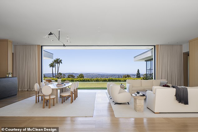 Think floor-to-ceiling glass, razor-sharp angles, and a house that texts you reminders to hydrate throughout the day
