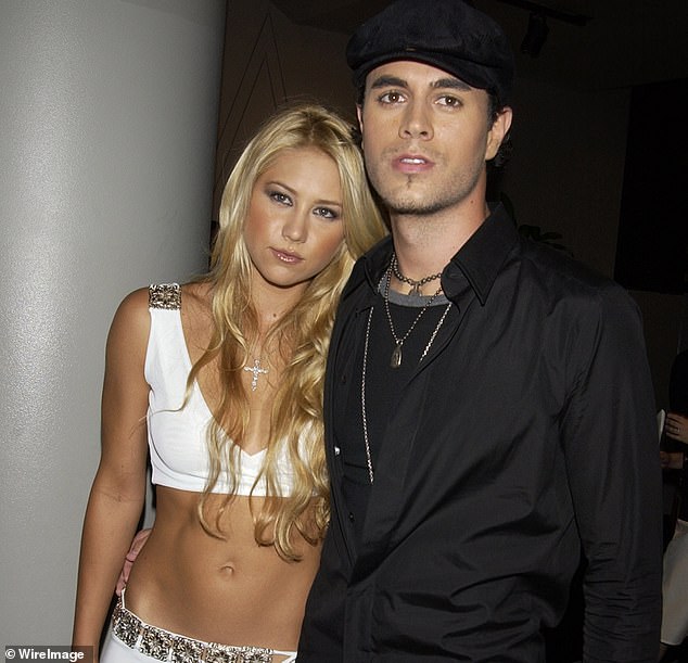 Anna and Iglesias (pictured in 2003) are expecting their fourth child together