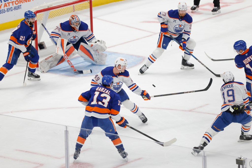 Bo Horvat #14 of the New York Islanders scores a goal during the third period when the New York Islanders played the Edmonton Oilers Thursday, October 16, 2025 at UBS Arena in Elmont, NY.