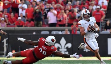 Taylor's OT run lifts No. 24 Virginia to a 30-27 victory over Louisville