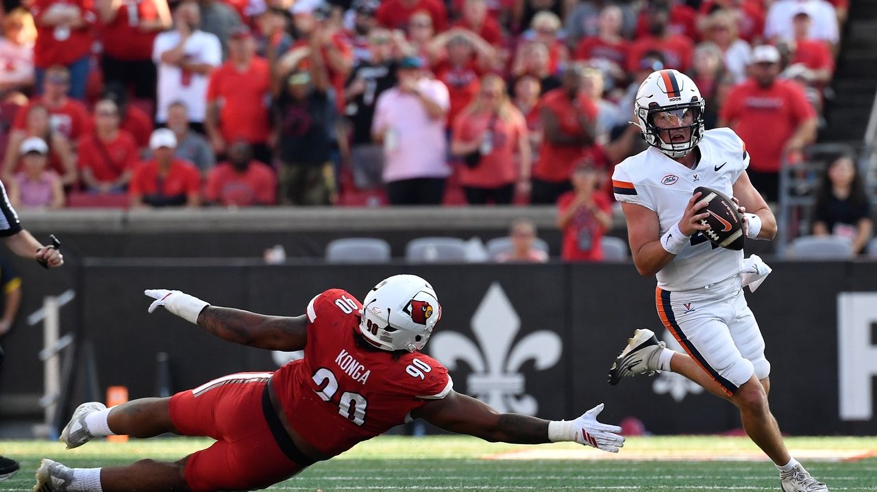 Taylor's OT run lifts No. 24 Virginia to a 30-27 victory over Louisville