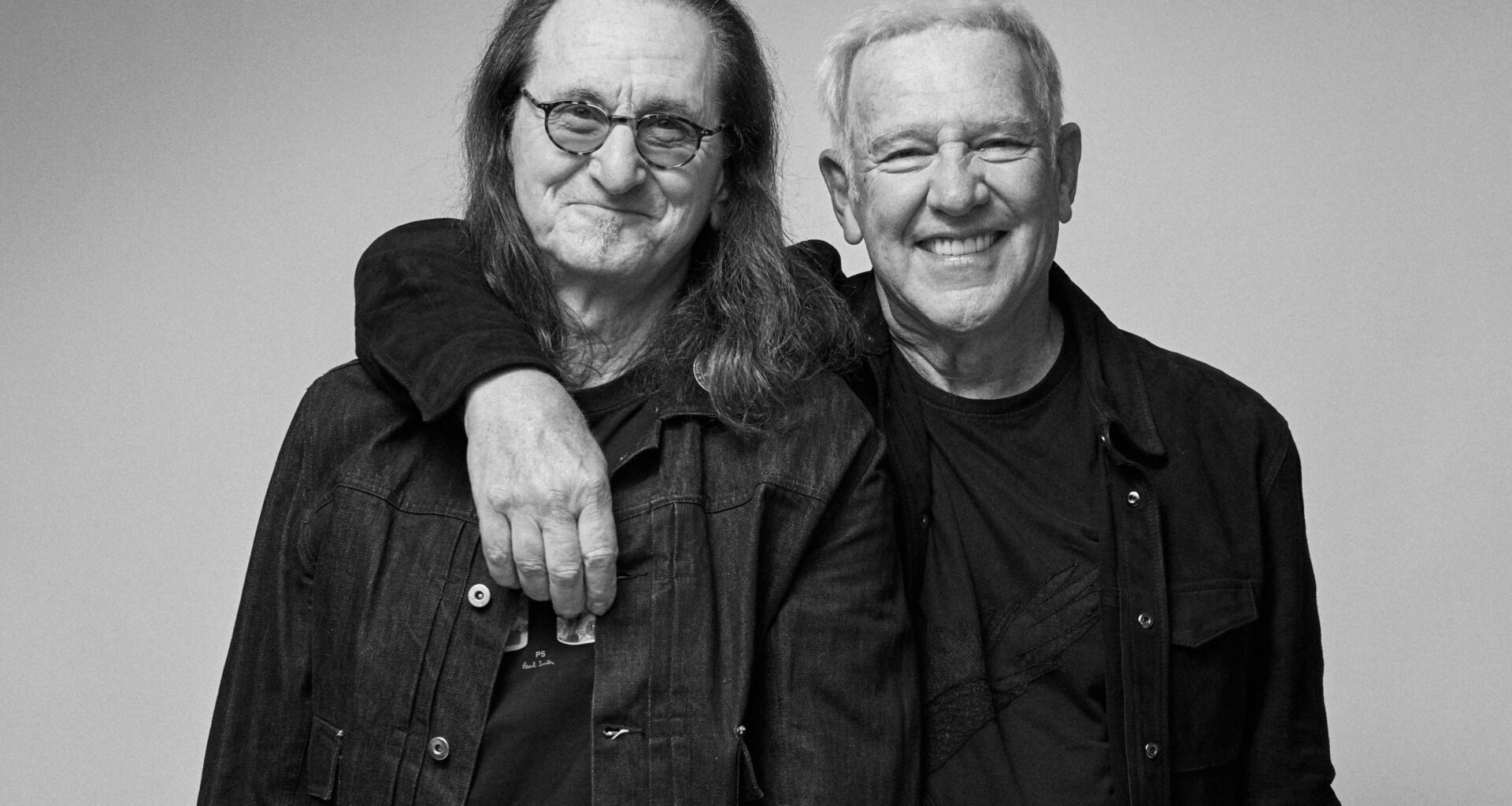 Two guys posing for a photo