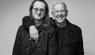 Two guys posing for a photo