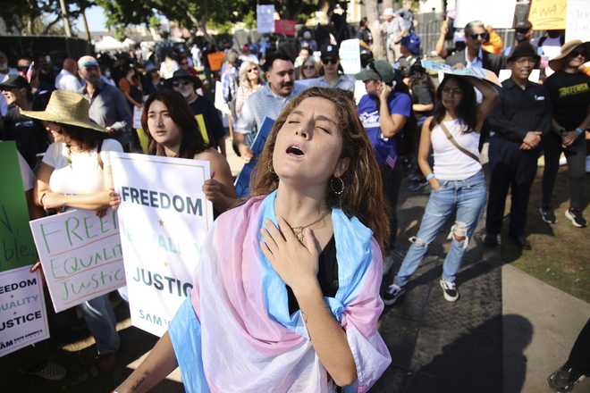 Supporters gather during an immigration rally on Saturday, Sept. 20, 2025, in Los Angeles.