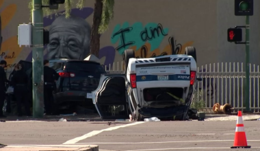 2 officers, arrestee hurt after police vehicle rolls over in Phoenix