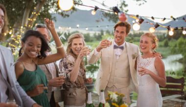 20-24 Years, 25-29 Years, 40-44 Years, 55-59 Years, African Ethnicity, Boho, Boho Wedding, Bride, Bridegroom, Bunting, Cape Town, Caucasian Ethnicity, Celebration, Celebratory Toast, Champagne, Champagne Flute, Chinese Ethnicity, Day, Decoration, Domestic Garden, Dress, Drink, Elegance, Fairy Lights, Flower, Glass, Guest, Happiness, Heterosexual Couple, Holding, Horizontal, Illuminated, Looking Away, Mature Adult, Mature Men, Mature Women, Medium Group Of People, Men, Mixed Race Person, Mountain, Multiethnic, Outdoors, Plate, Pond, Selective Focus, South Africa, Standing, Suit, Table, Togetherness, Tree, Vase, Wedding, Wedding Dress, Wedding Reception, Well-Dressed, White Wine, Wine Bottle, Wineglass, Women, Young Adult, Young Couple, Young Men, Young Women