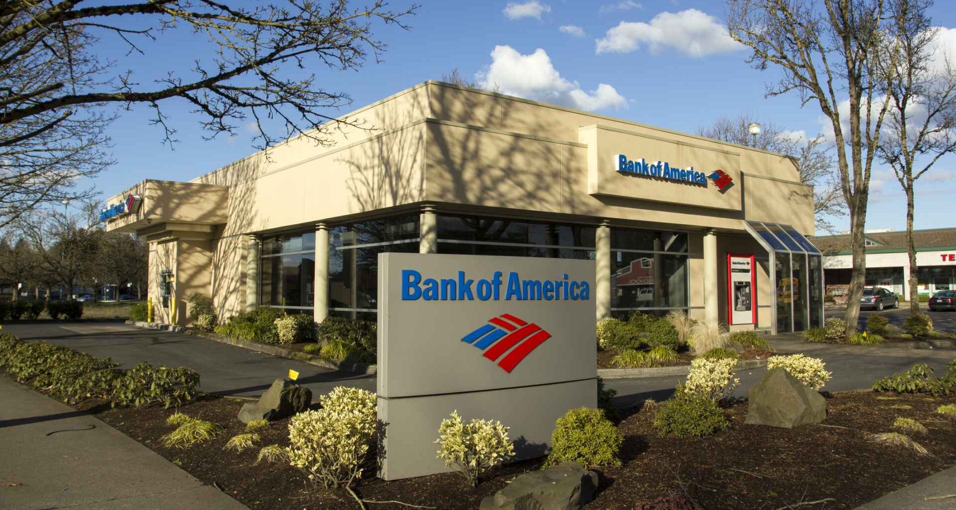 A view of the exterior facade of a Bank of America branch, showcasing its signage and architecture.