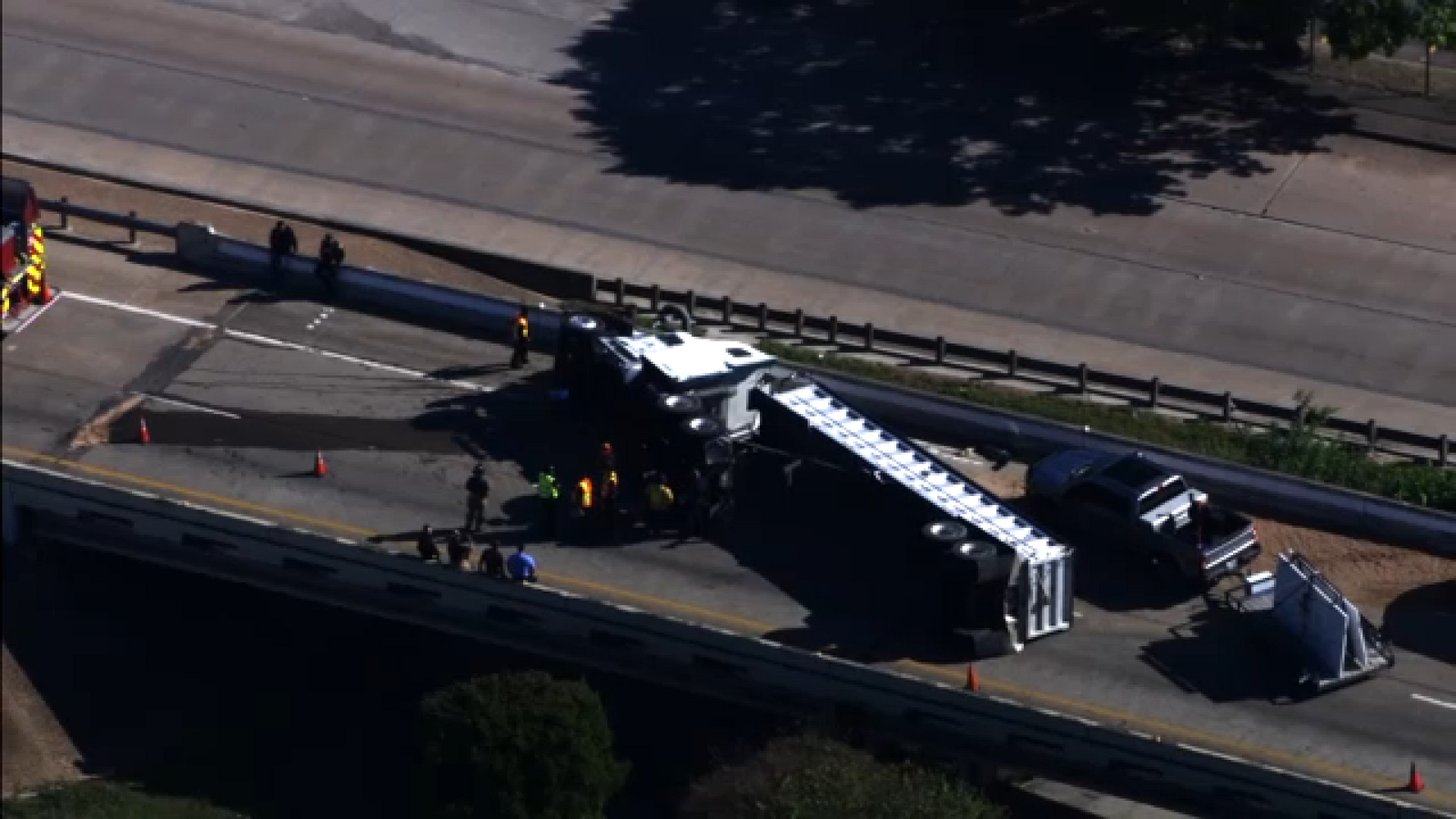 Overturned big rig blocking I-610 North Loop eastbound ramp to I-69 Eastex Freeway