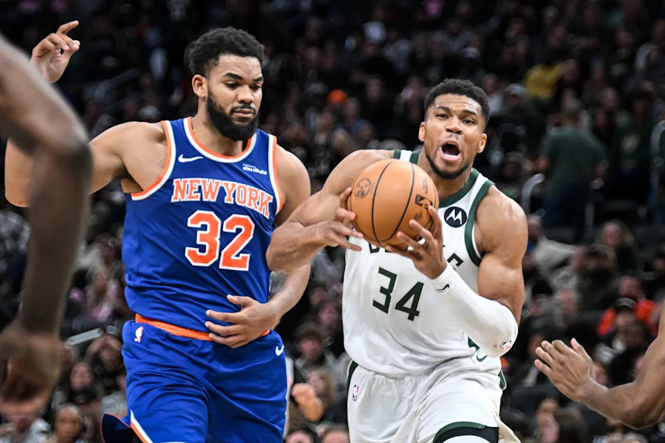 Milwaukee Bucks forward Giannis Antetokounmpo (34) drives past New York Knicks center Karl-Anthony Towns (32) during the fourth quarter in a game Tuesday, October 28, 2025, at Fiserv Forum in Milwaukee, Wisconsin. The Bucks won 121-111.