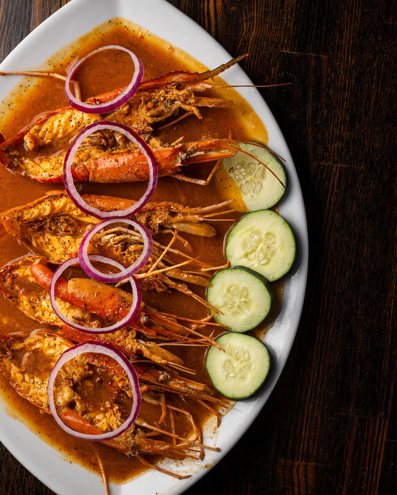 Sauteed spicy shrimp with cucumbers and red onions.
