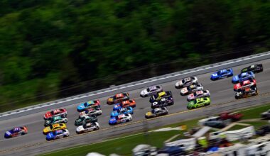 General view of NASCAR Cup Series cars pack racing at Talladega