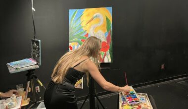 Local artist Beth Haizlip hosted a pop-up studio during the event, where guests could help paint a piece that would be auctioned off.