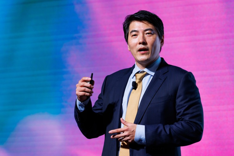 Jason Kwon speaks on stage