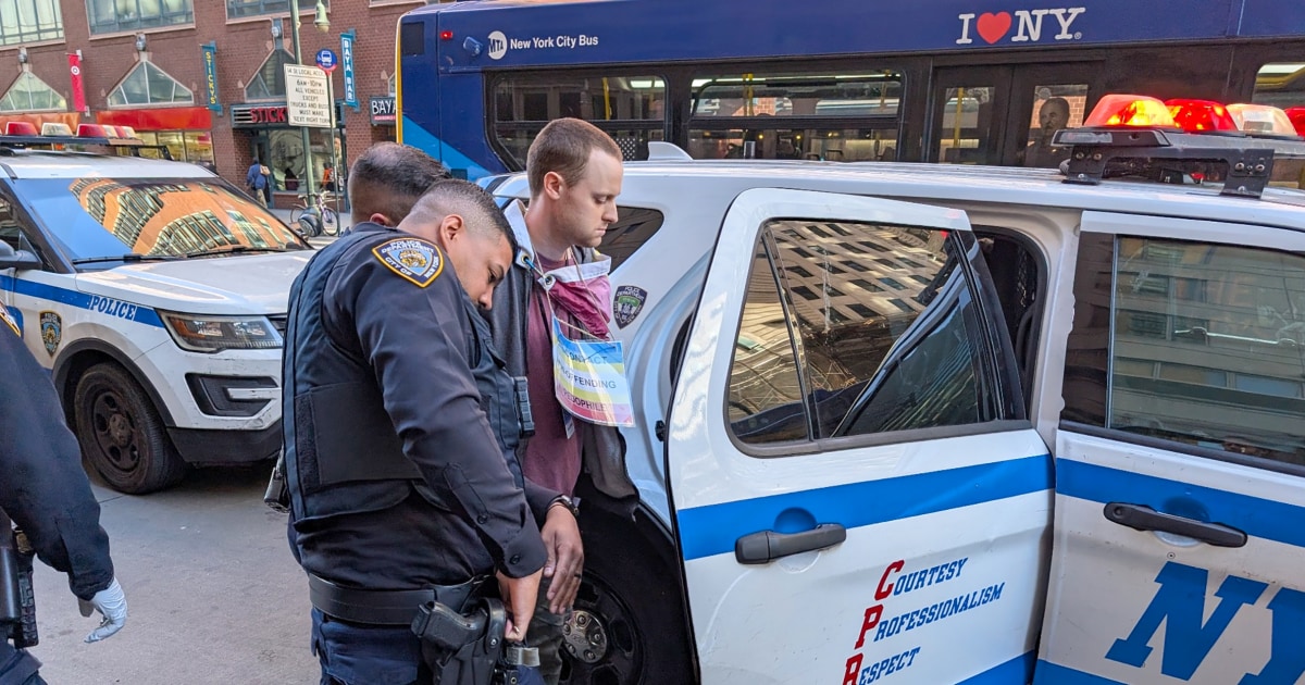 Armed man wearing 'non-offending pedophile' sign storms stage at NYC Wikipedia conference