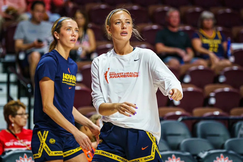 Aug 17, 2025; Uncasville, Connecticut, USA; Indiana Fever guard Sophie Cunningham (8) and Indiana Fever guard Lexie Hull (10) warm up before the start of the game against the Connecticut Sun at Mohegan Sun Arena. Mandatory Credit: David Butler II-Imagn Images© David Butler II-Imagn Images