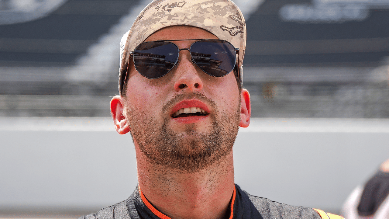 Sep 27, 2025; Kansas City, Kansas, USA; Chase Briscoe celebrates winning the starting pole position for the NASCAR Cup Series race at Kansas Speedway