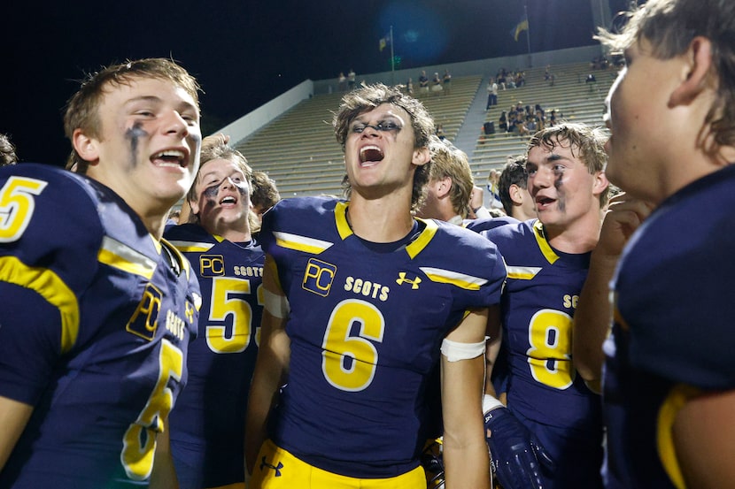 Highland Park's players including Matthew White (5), left, and Highland Park's Langdon...