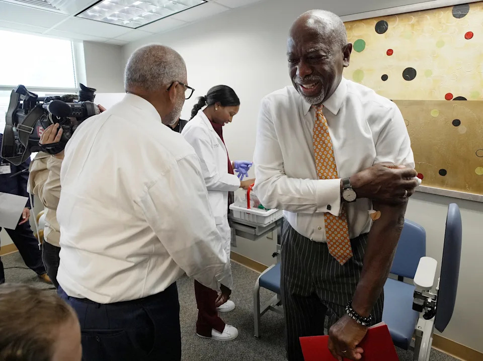 Meharry Medical College CEO and President Dr. James Hildreth rolls down his shirt sleeve after giving blood at the Meharry Medical College's Center for Excellence in Clinical and Translational Research Monday, Oct. 6, 2025 in Nashville, Tenn. Meharry is launching a study to increase the global genomic database to include more people of African ancestry because they now only comprise 2% or less of the data. Expanding the database will help predict disease risks and guide prevention and treatment.