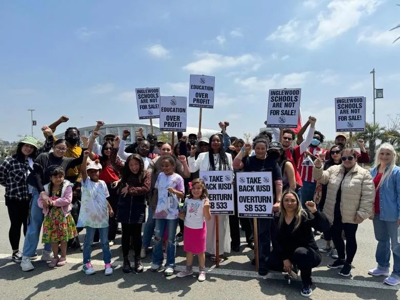 Inglewood residents, teachers, and students protest outside SoFi Stadium after plans to close down local schools were announced. (Courtesy of Fre’Drisha Dixon)