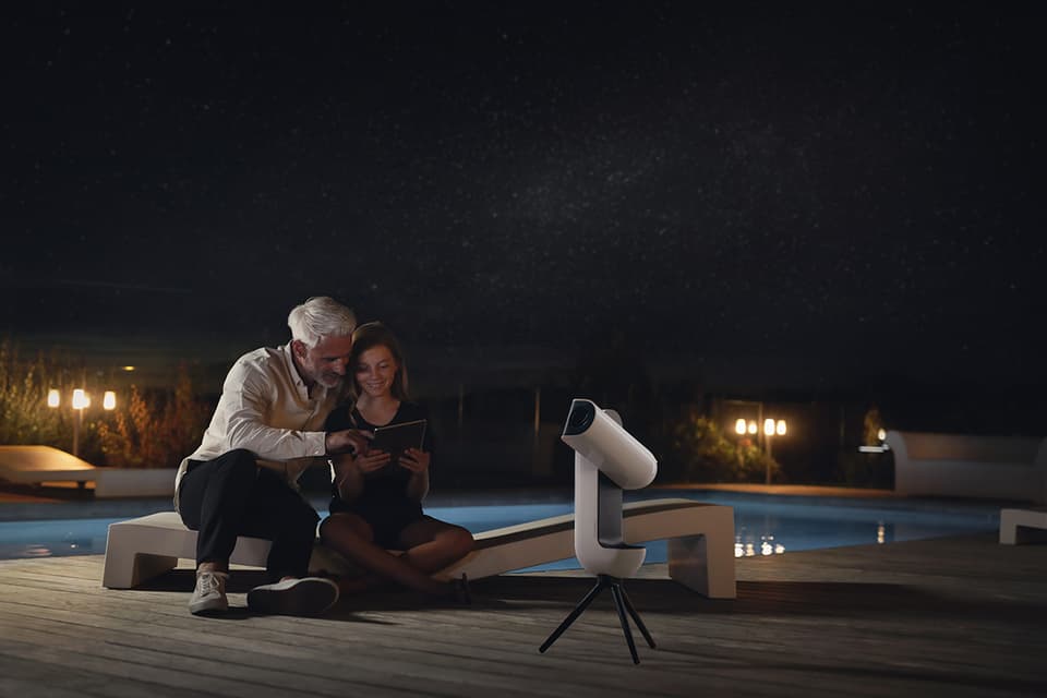 Couple with telescope