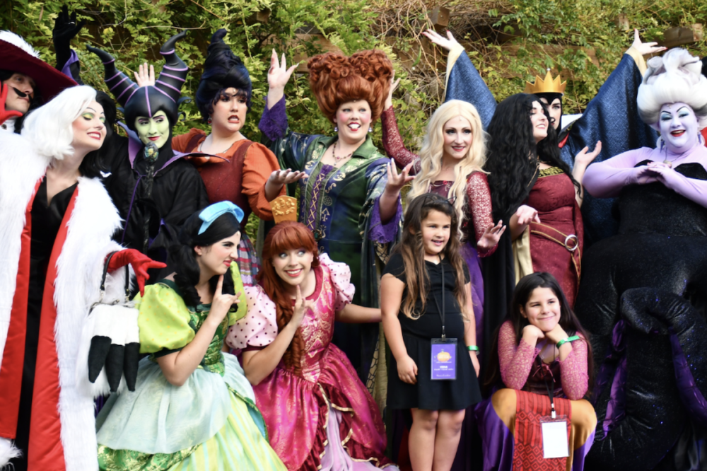 people in halloween costumes in a group