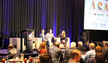 Economic development officials from across the I-35 corridor participated in a discussion panel about the region during the Oct. 8 summit. (Andrew Creelman/Community Impact)