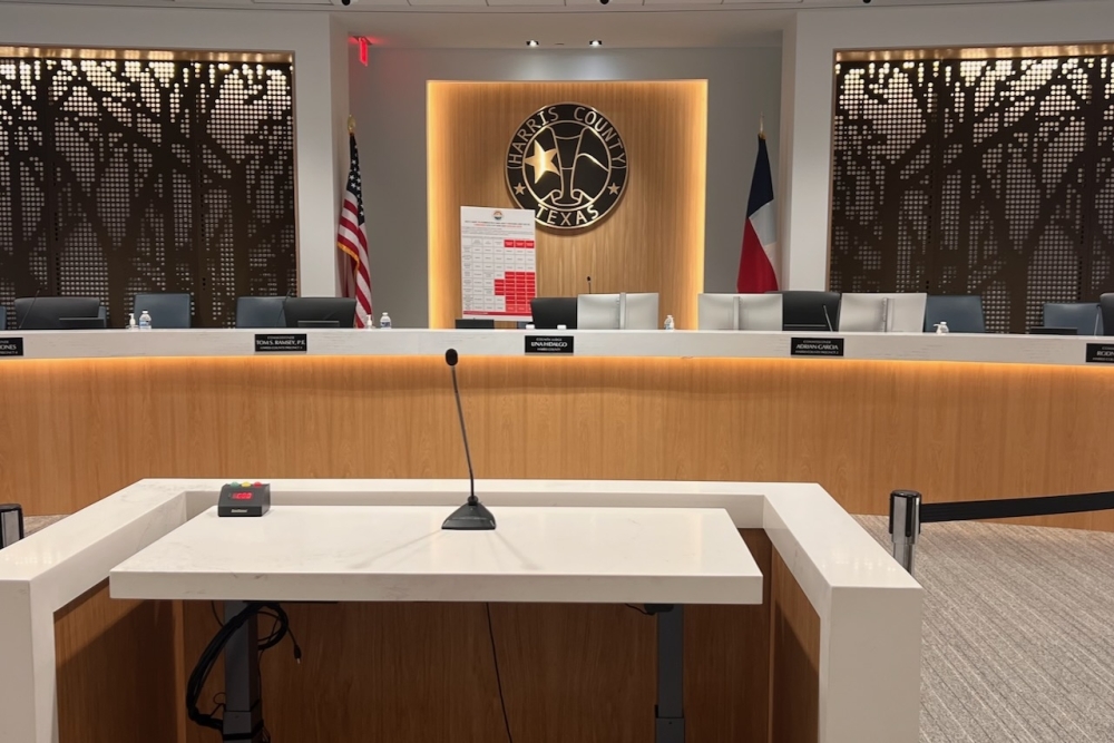 A photo of inside Harris County commissioners court.
