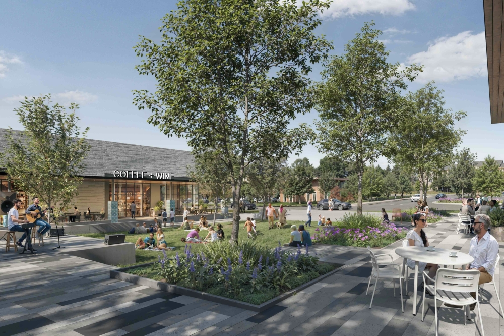 a rendering of an outdoor plaza with trees and table and chairs