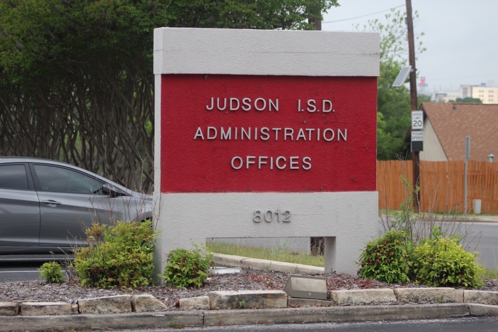 A sign for the Judson Independent School District administrative offices are seen on a cloudy day in Live Oak, Texas.
