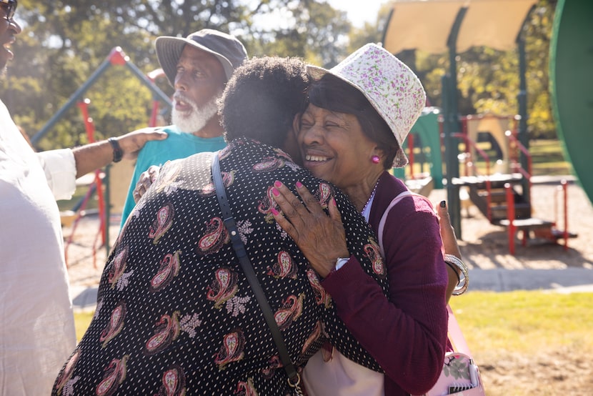 (From left) Texas Rep. Toni Rose hugs longtime Glendale resident Lena Boyd during a...