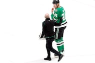 Dallas Stars center Roope Hintz (24) skates off the ice and to the locker room after be ing...