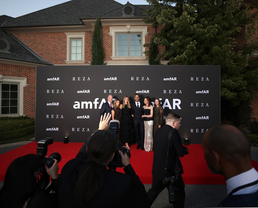 Charlotte Jones (second from right) navigates the red carpet along with members of her...