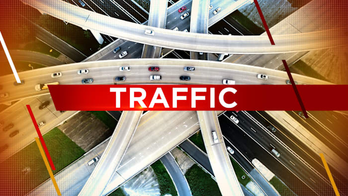 Law enforcement is at the scene after an 18-wheeler flips over on Beltway 8