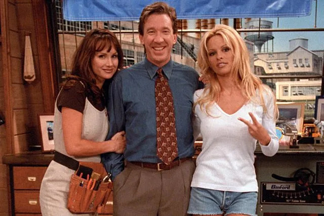 ABC/Disney via Getty  Debbe Dunning, Tim Allen, and Pamela Anderson in 'Home Improvement'