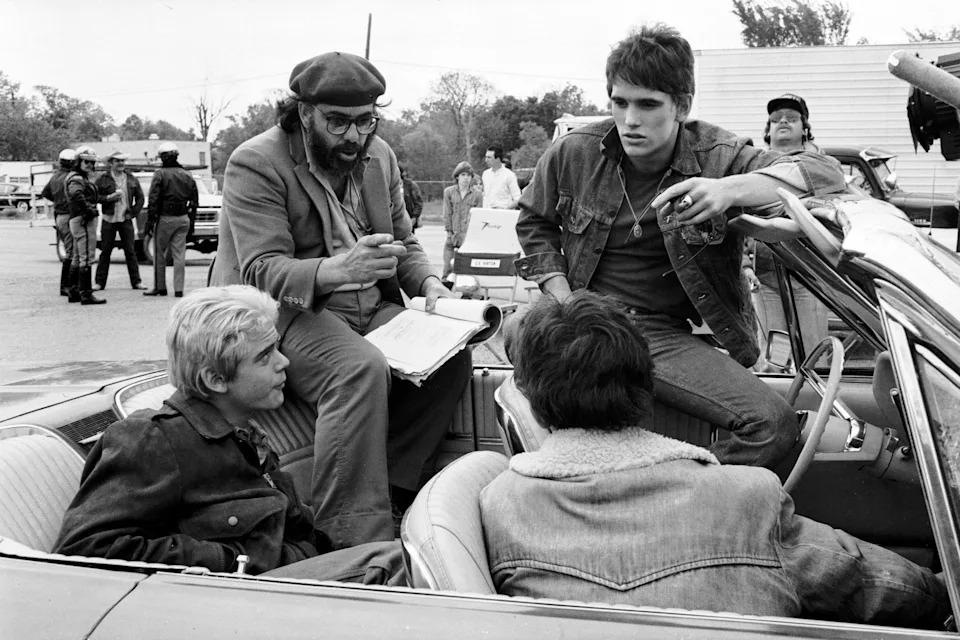 Director Francis Ford Coppola works with actors, from left, C. Thomas Howell, Ralph Macchio and Matt Dillon on "The Outsiders." Coppola filmed the 1983 movie, based on Oklahoma author S.E. Hinton's iconic book, in Tulsa.