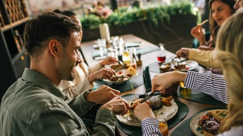 Group of friends eating dinner