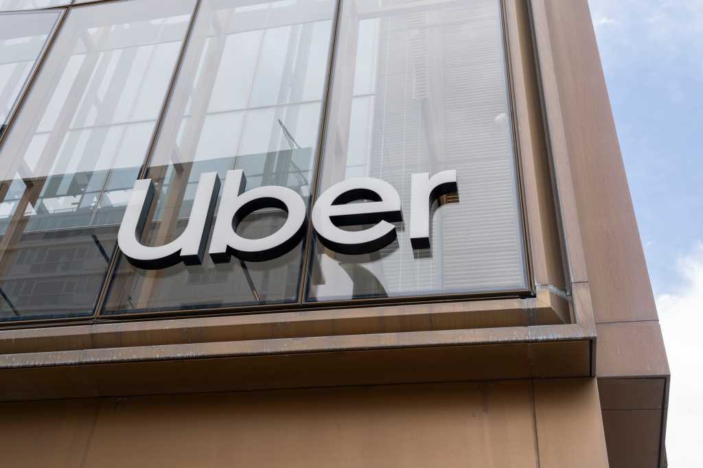 Uber sign on its headquarters building in San Francisco, California, USA - June 6, 2023. Uber Technologies is a transportation conglomerate.