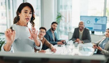 Manager, businesswoman and whiteboard for presentation, training and coaching for investment in company. Team, leader and workshop meeting for learning, proposal and brainstorming ideas for finance