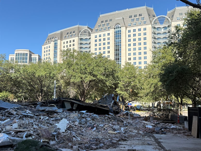 A pile of rubble, the formerly vacant Sambuca, sits in the shadow of Hotel Crescent Court on...