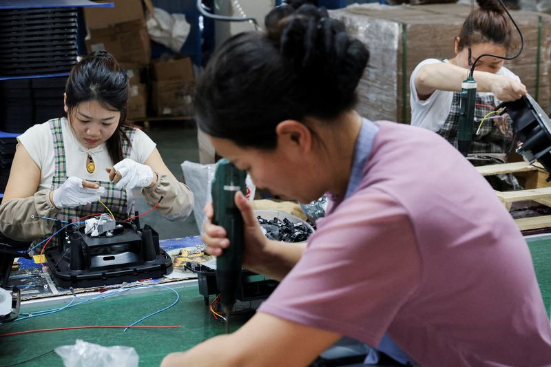 China factory activity shrinks for seventh month, PMI shows