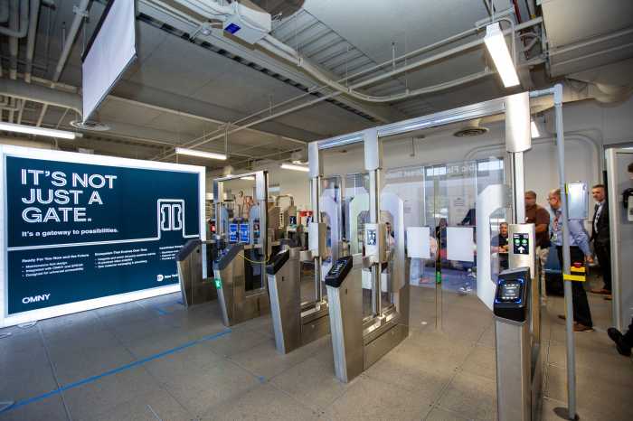 Fare evasion is not just a problem in NYC. Here's how other American cities are tackling it. 3 modern fare gates in a NYC subway station