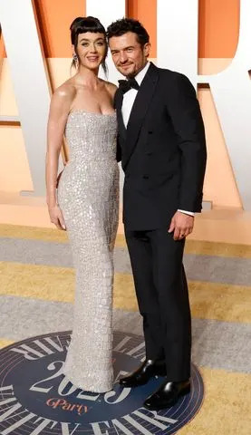 Taylor Hill/FilmMagic From Left: Katy Perry with Orlando Bloom in Beverly Hills, Calif. in March 2025