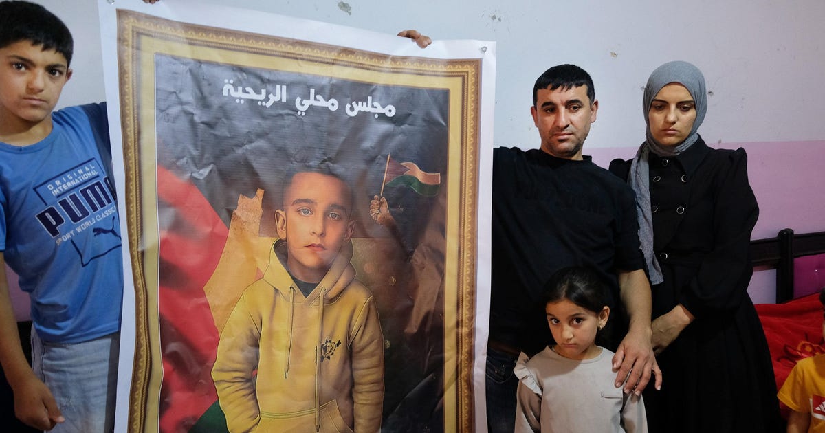 A Palestinian boy, 9, stood at a distance. An Israeli soldier knelt and shot him dead - Haaretz