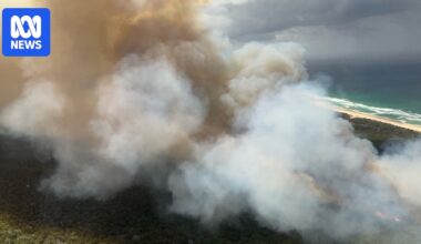 Campers evacuated, residents on alert as Moreton Island bushfire intensifies