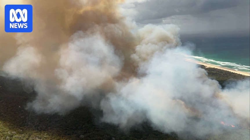 Campers evacuated, residents on alert as Moreton Island bushfire intensifies