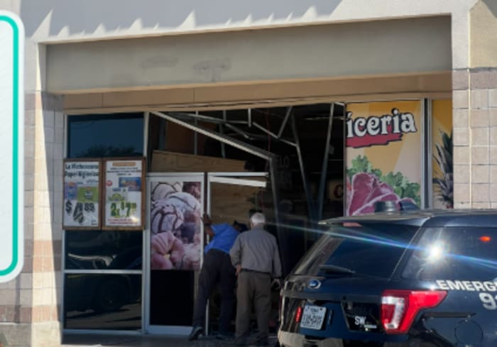 1 person detained after car drives into Houston meat market